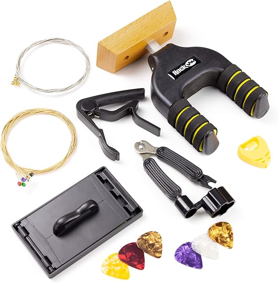 RockJam Guitar Accessories Kit with Capo, Hanger, Winder & Strings | Guitar accessories bundle with wall hanger, capo, string winder, fret cleaner, spare strings and lessons